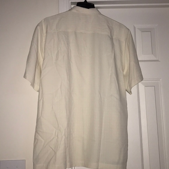 This is a Tommy Bahama tropical dress shirt. - Picture 3 of 3